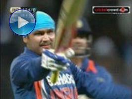 The fastest ever Indian ODI ton by Virender Sehwag 125 not out led to a 10 wicket win in a rainaffected match. Sehwag and Gambhir 63 not out put on 201 runs  a record opening stand in an ODI game as India won the oneday series 30 with one game left. Earlier  Brendon McCullum smashed 77 as New Zealand amassed 2705 off 47 overs. 4th ODI Hamilton Mar 2009.